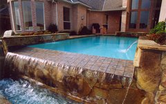 negative edge pool with flagstone